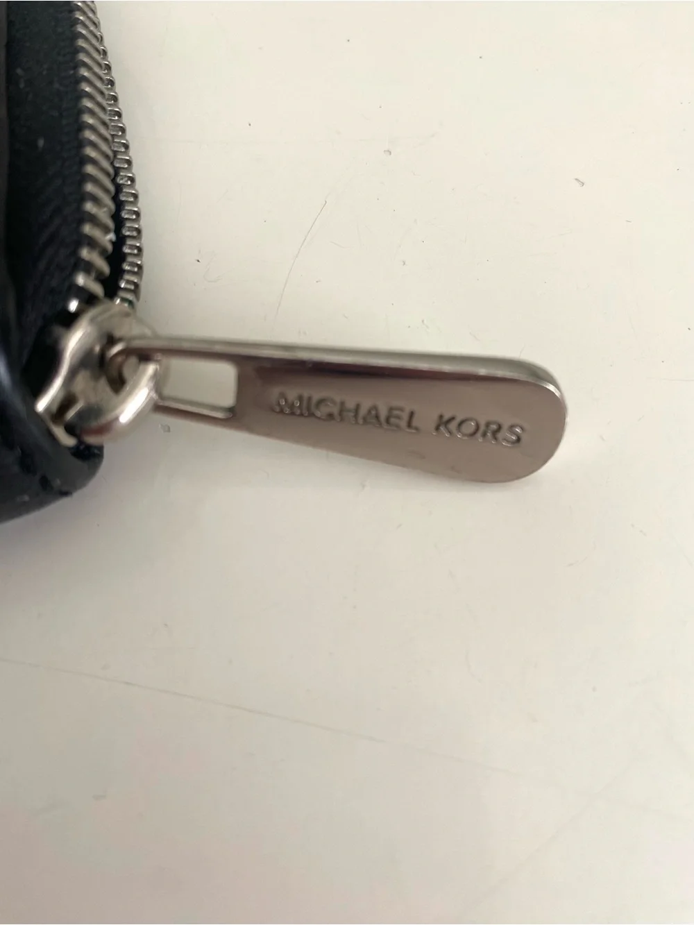 Michael Kors Black Leather Zip-Around Wallet with Silver MK Logo